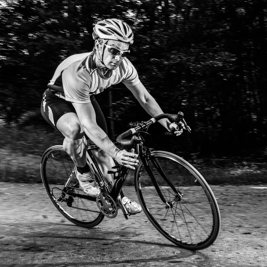 cyclist in black and white